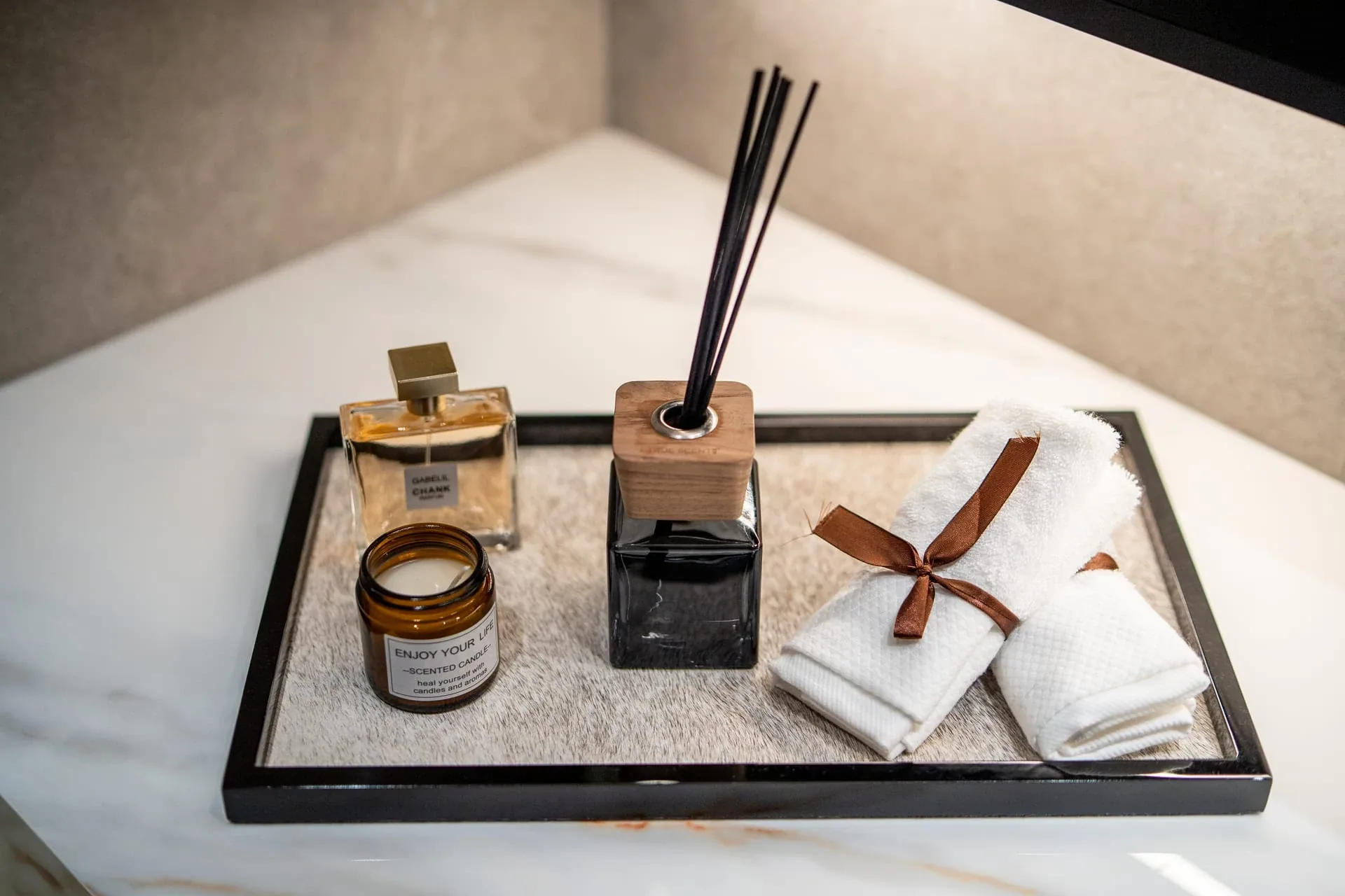 Bathroom countertop and interior styling in the AYANA Heights show residence